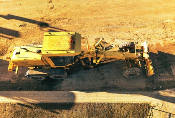 Grader im Straßenbau